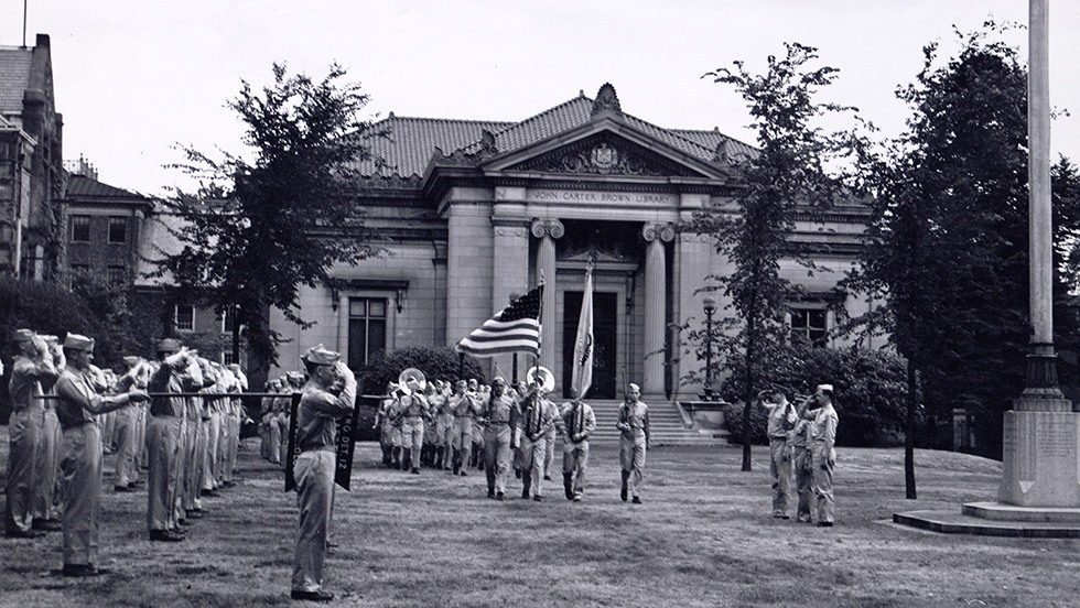 The Army Band passing reviewing party, Summer 1943. In the background is the John Carter Brown Library.