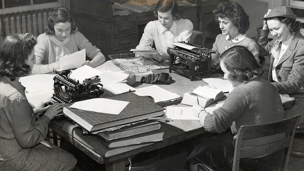 Pembroke women working at the school newspaper, the Pembroke Record, in 1940.