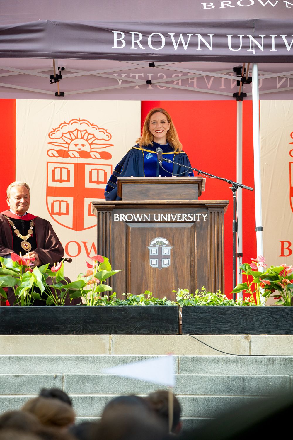 IBES DIrector Kim Cobb at podium delivering Convocation speech