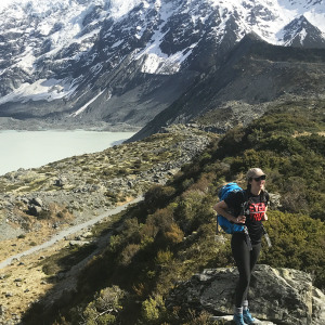 student intern positioned in mountainous landscape