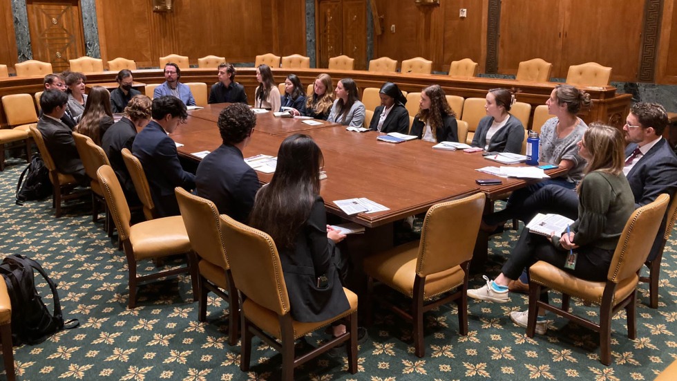 Members of ENVS 1574 sit around a table in Congress