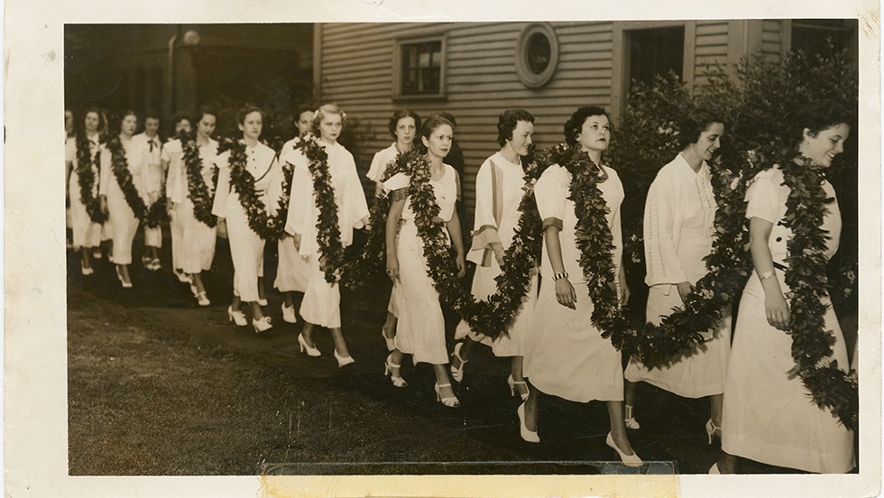 Photograph of procession by Pembroke College students on Ivy Day 