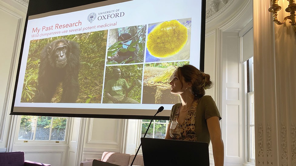 Current Voss postdoc Elodie Freymann at podium