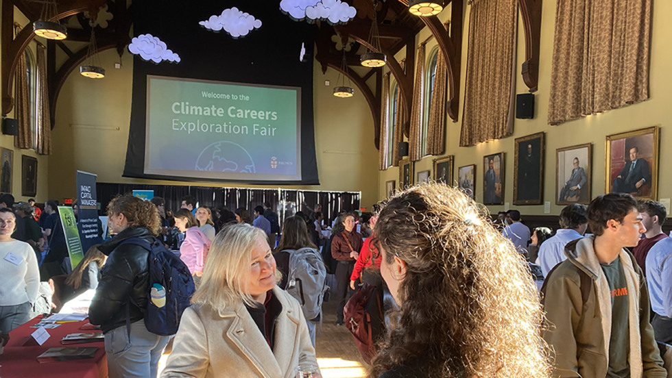 Dawn King talking with student at career fair 2025