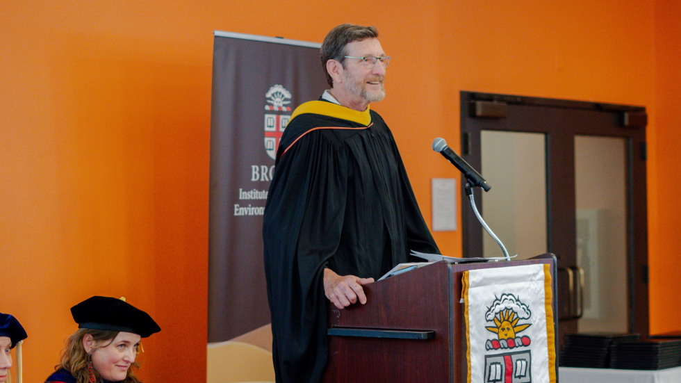 Kurt Teichert delivering a speech at Commencent