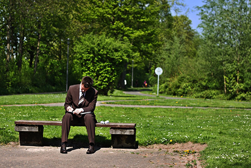 Man sitting on park bench